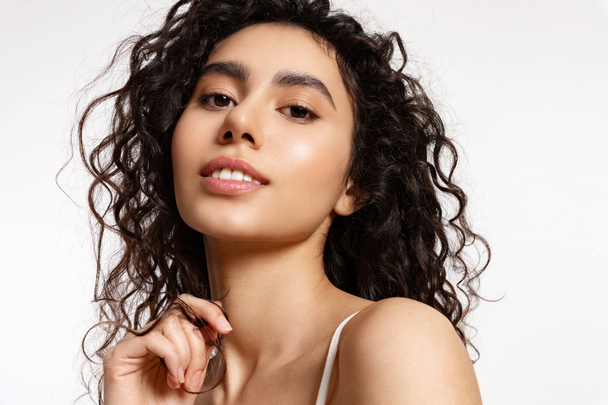 Real Woman With Beauty Curly Black Hair On White Background