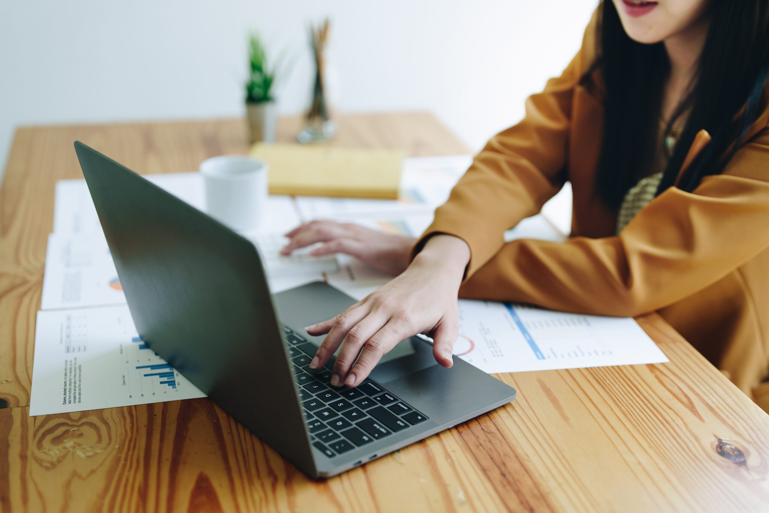 Accountants, Asian Auditors Are Using Calculators And Computers To Review